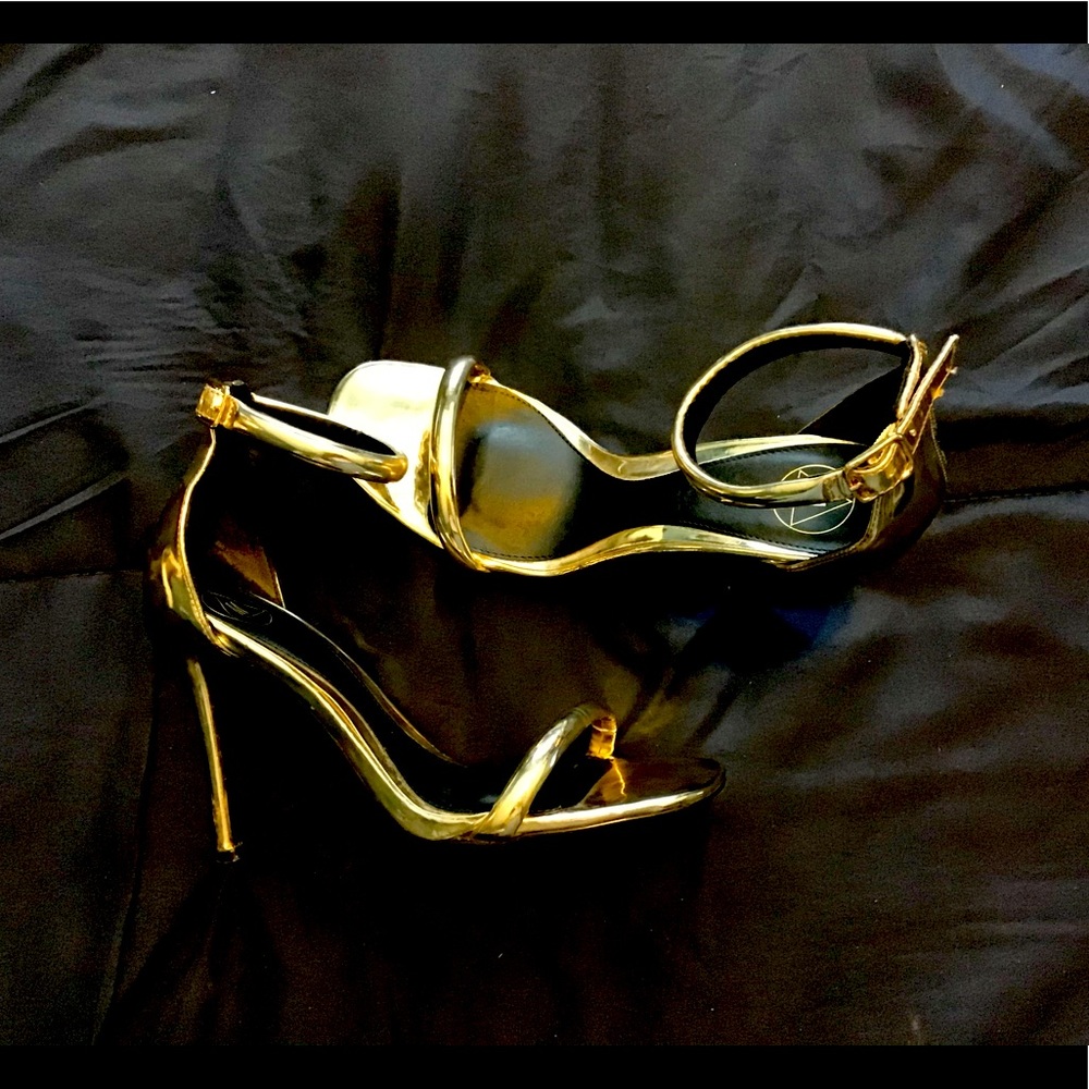 Gold strappy heels